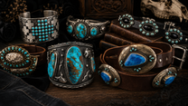 Rare artisan sterling silver turquoise cuffs and concho belts styled with dark western editorial props for Iron & Iris